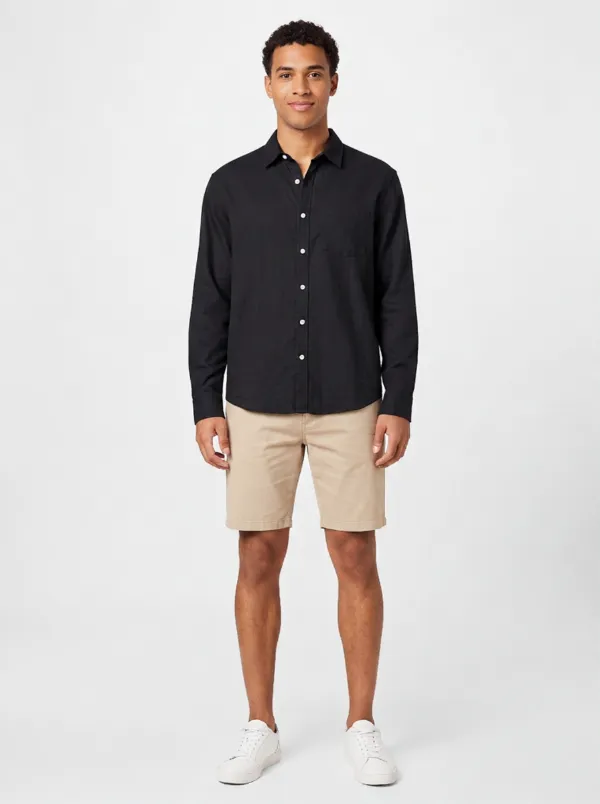 The same shirt recolored and worn by an AI model