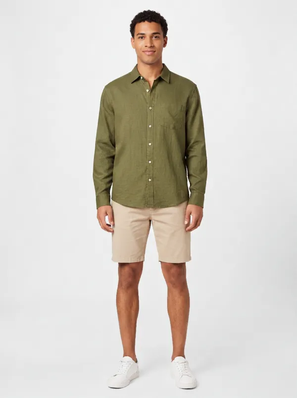 The same shirt recolored and worn by an AI model